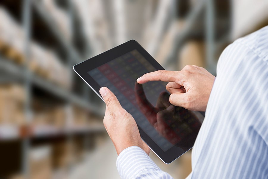 Checking damage on a pallet of goods